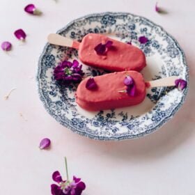 pink ice cream on blue and white plate