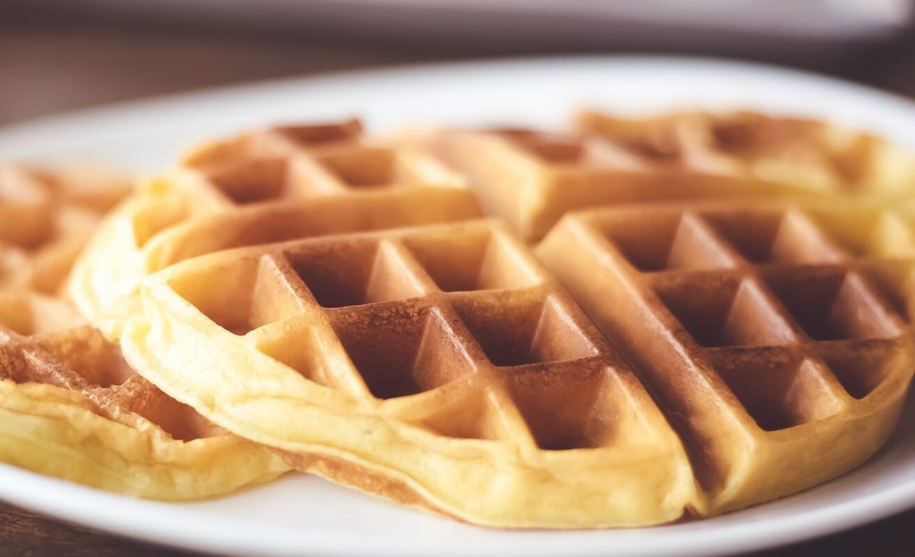 shallow focus photography of waffle on plate