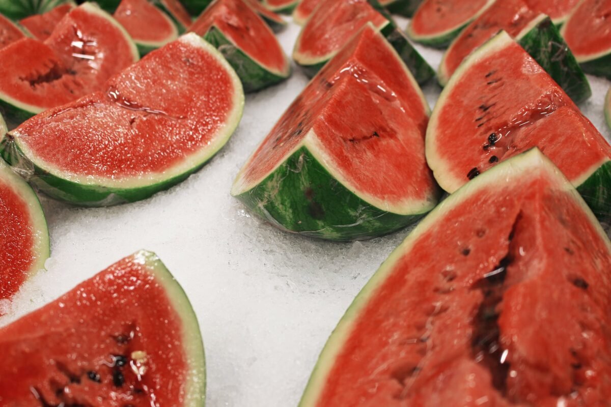 sliced watermelons on ice