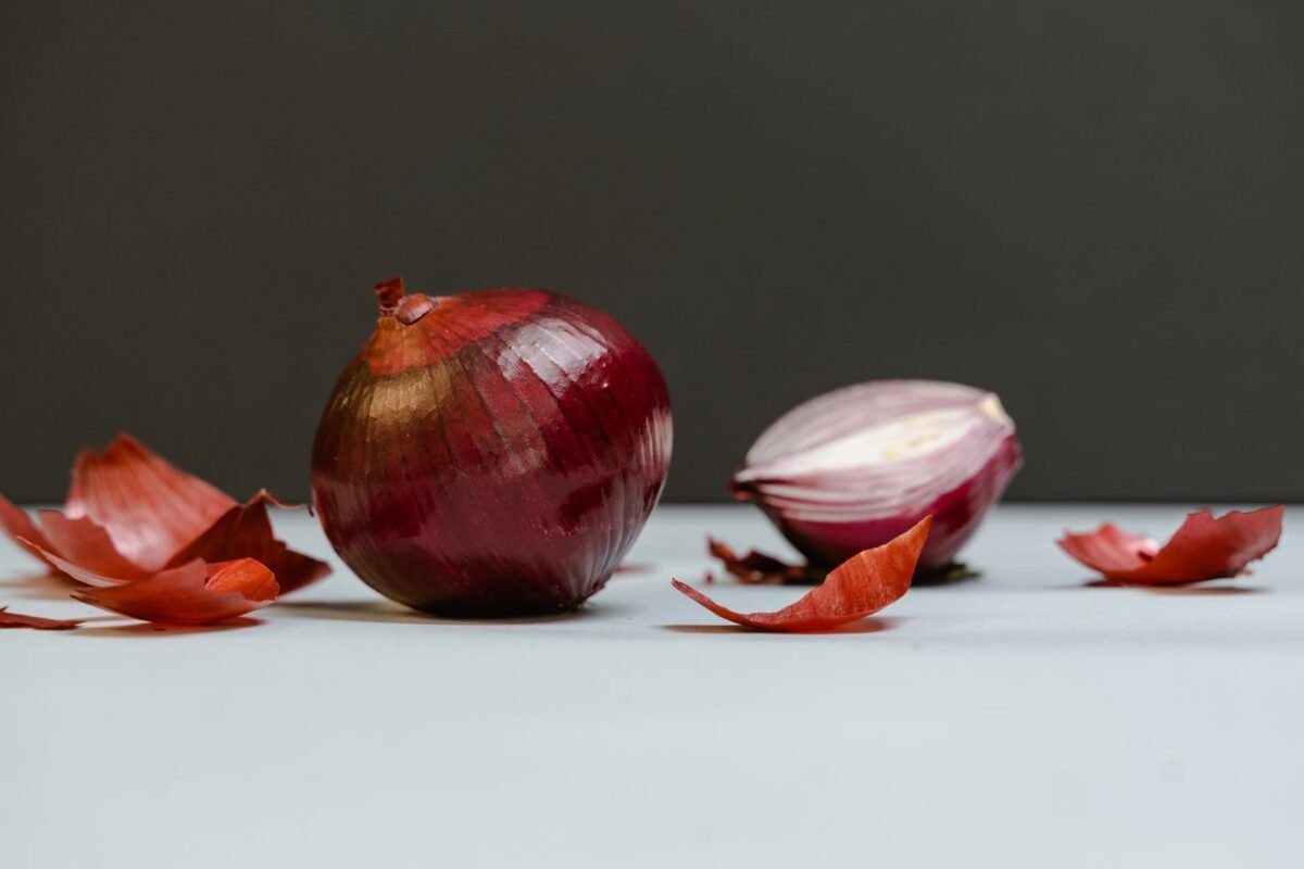 close up shot of onions on a white surface