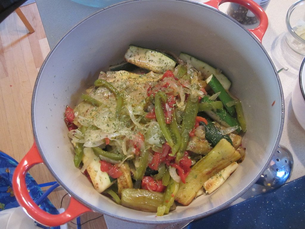 "Ratatouille in French oven" by trenttsd is licensed under CC BY 2.0 .